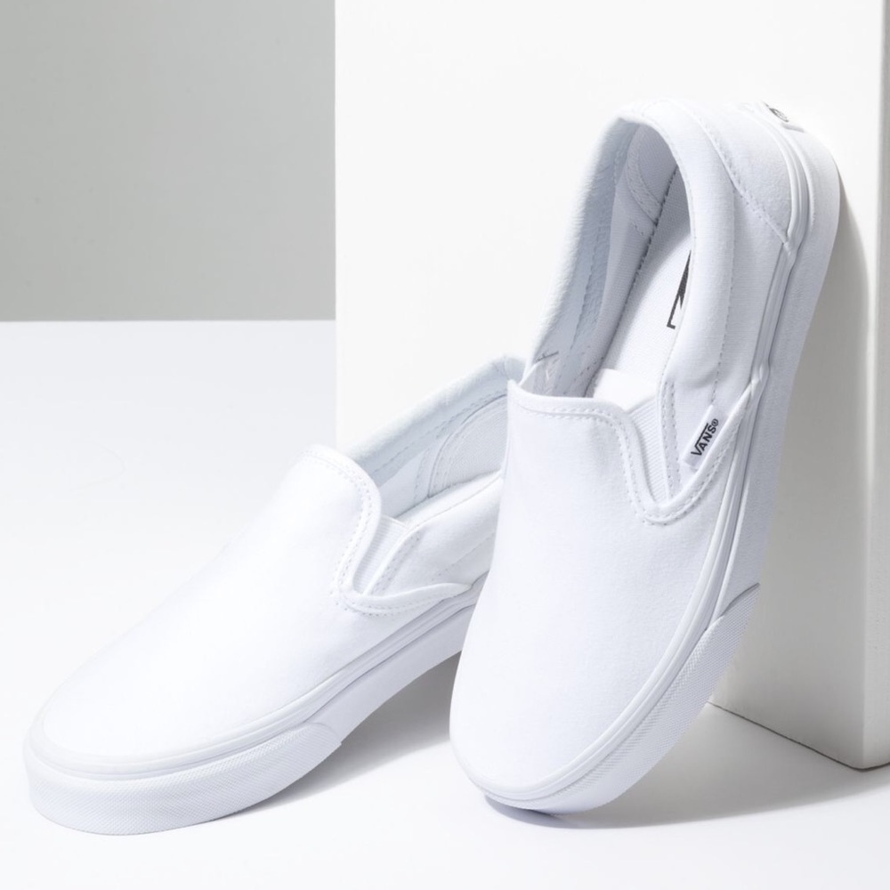 White slip on vans